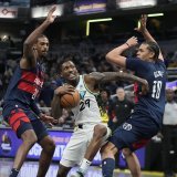 Kyshawn George (18) et les Wizards ont subi la loi des Pacers dimanche KEYSTONE/AP/Darron Cummings